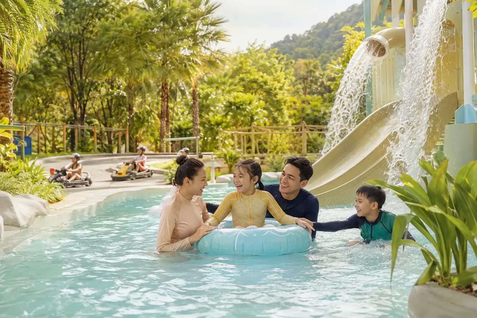 A family enjoying water attractions and recreational activities in Thailand.