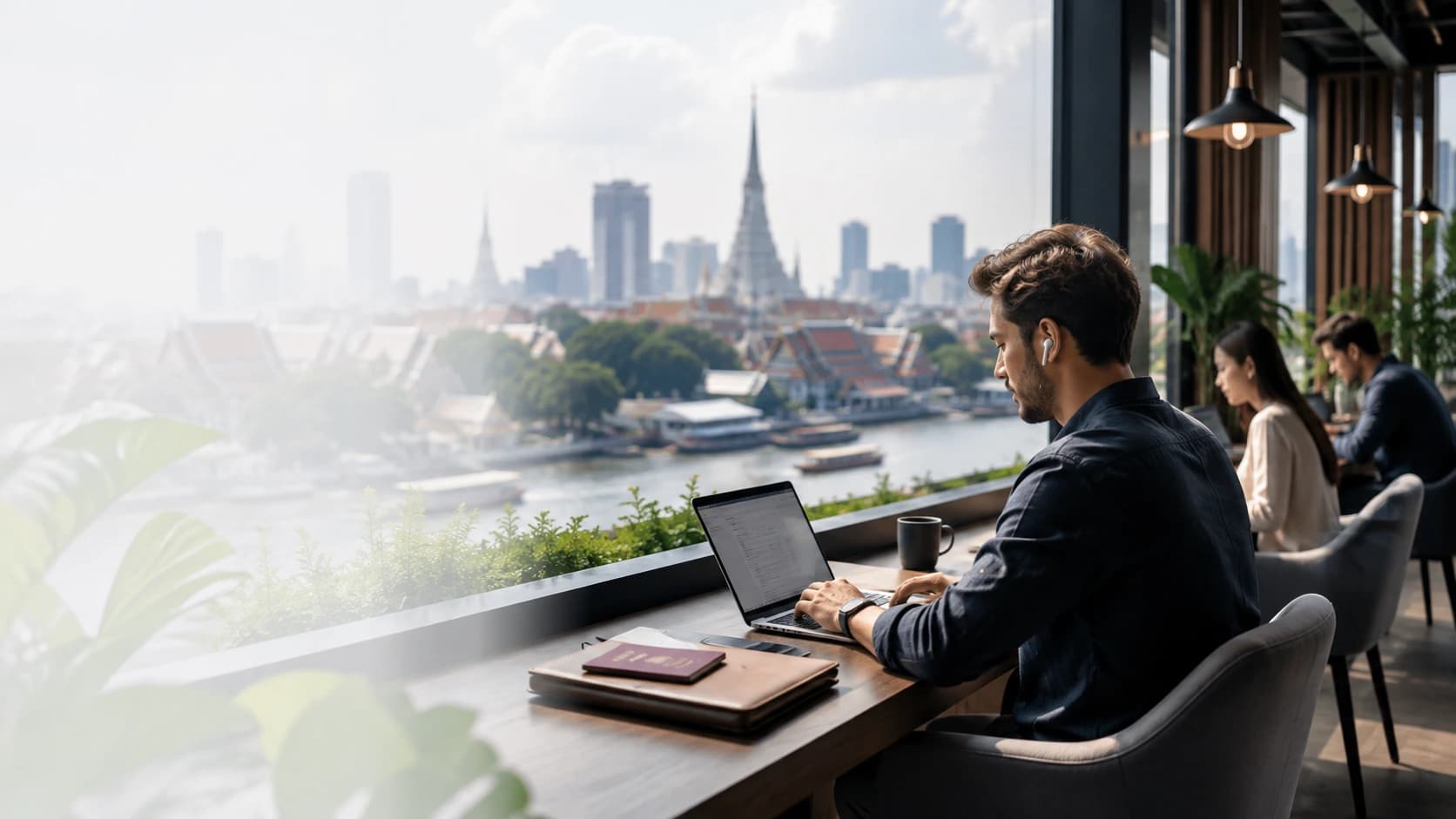 Remote professional working from a coworking space in Thailand