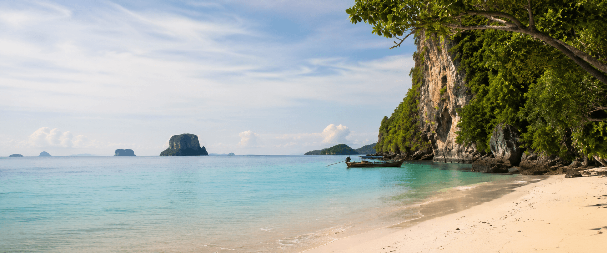 The gateway coastline leading to the quieter Trang Islands cluster.
