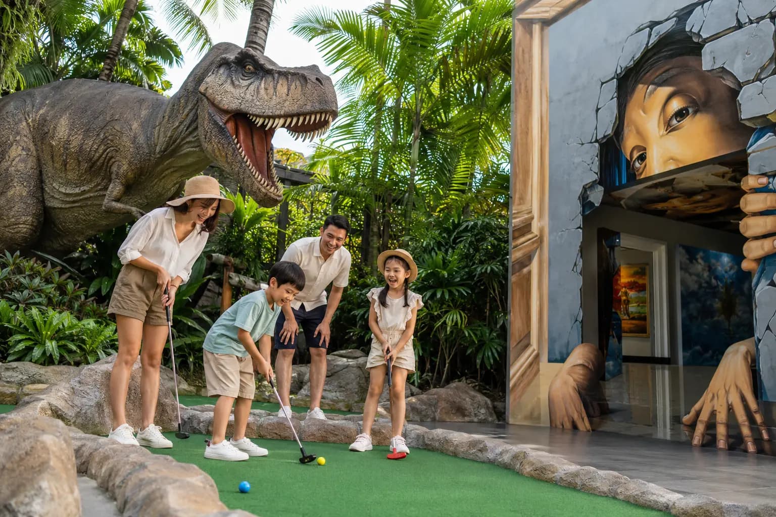 Family enjoying conceptual dinosaur mini-golf and interactive illusion exhibits.